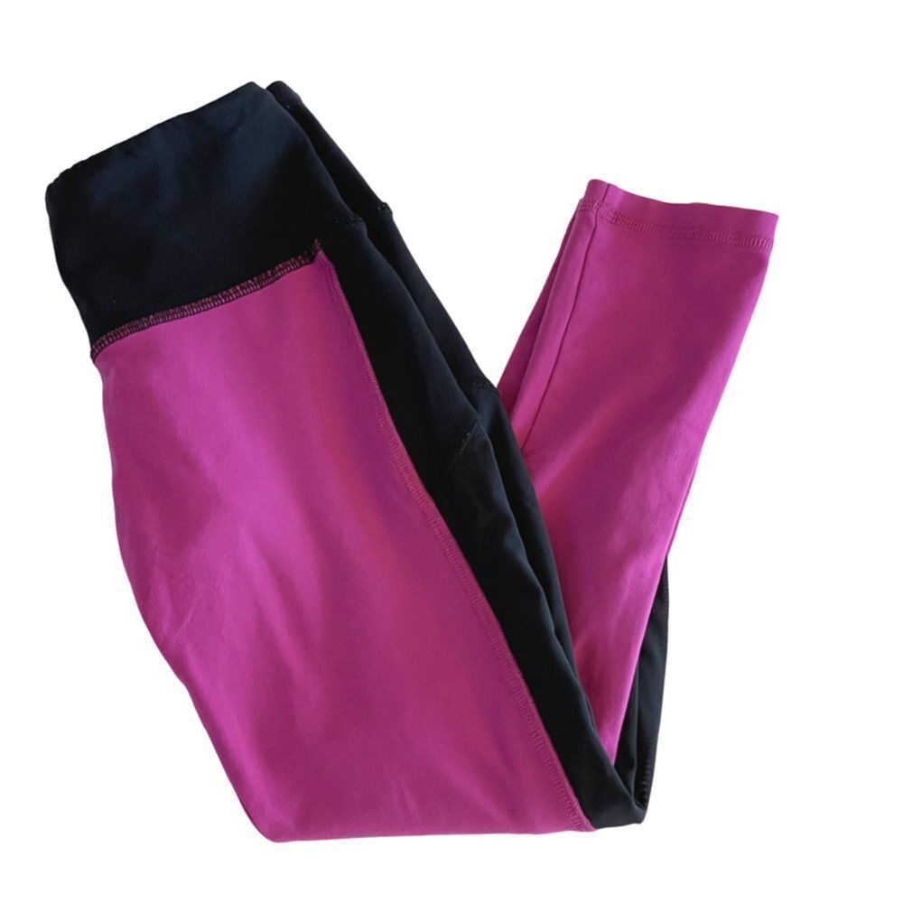 PINK and Black Flywheel Capri workout leggings